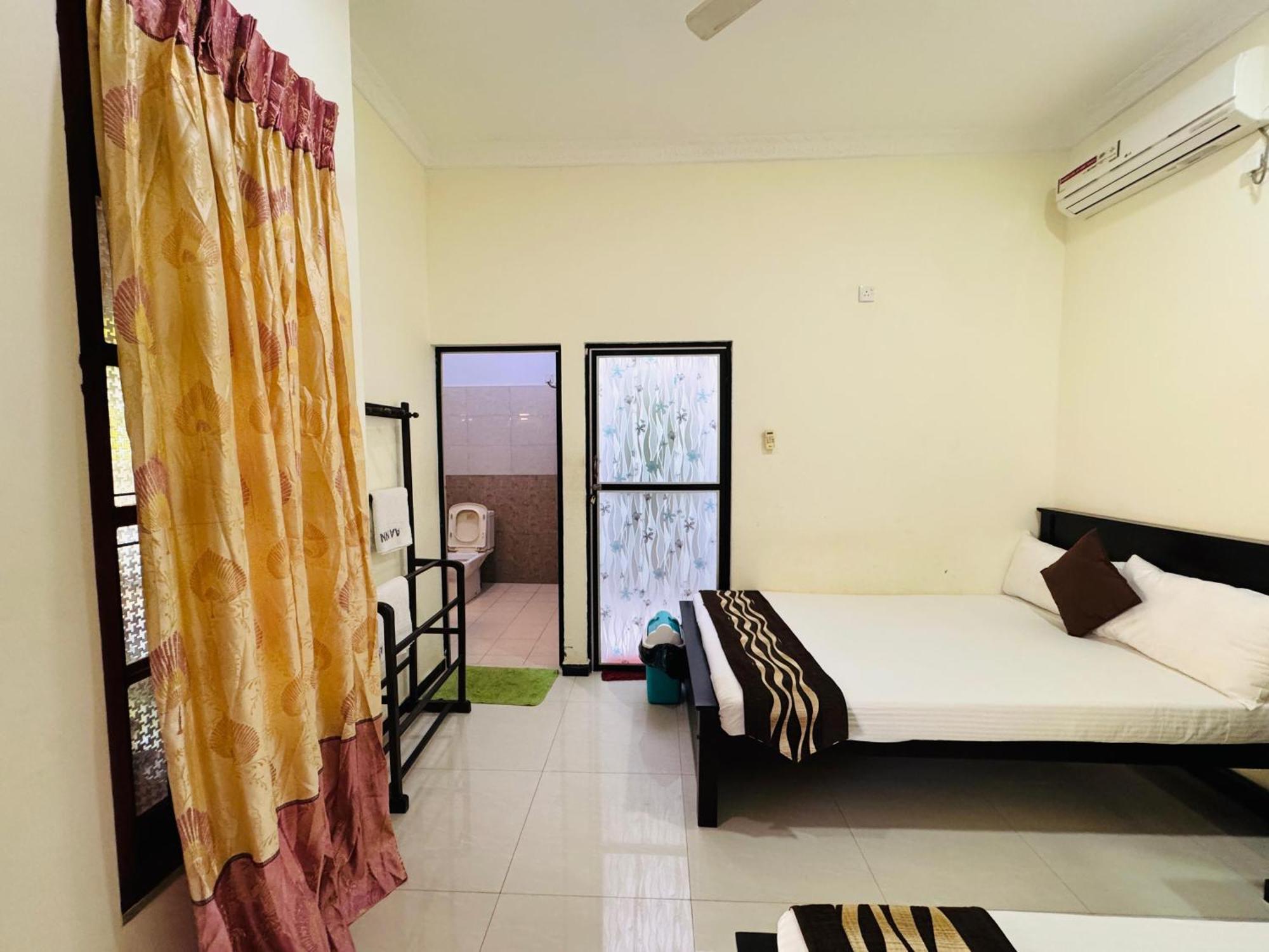Aa Inn Trincomalee Szoba fotó